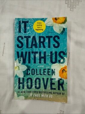 It Starts With Us by Colleen Hoover - Teal Cover with Yellow & White Flowers
